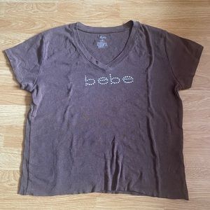 Bebe Brown Top with Rhinestones. Shirt is smaller then what it seems.